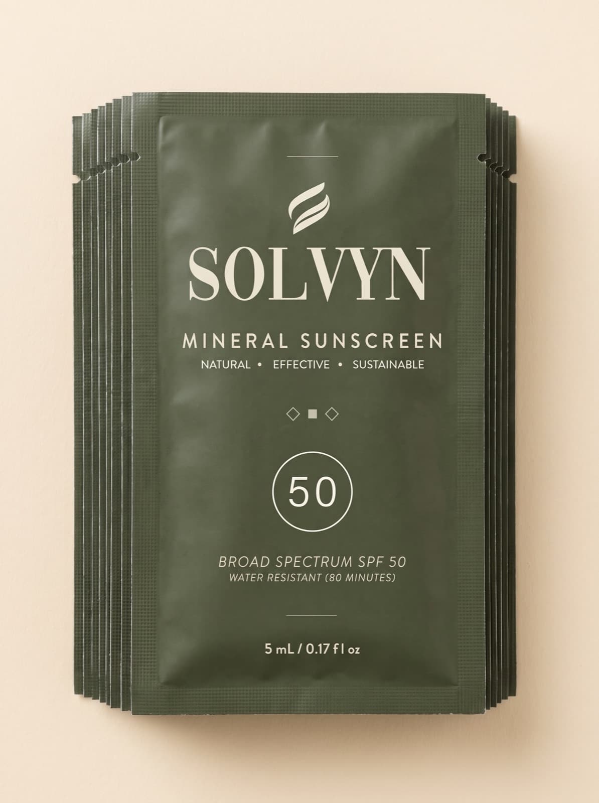 A stack of sealed Solvyn Shield sunscreen packets
